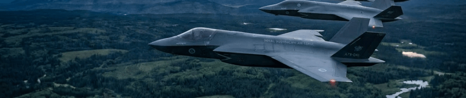 Three Royal Australian Air Force stealth fighter jets flying in formation over a forested landscape with blue radar waves depicted around them